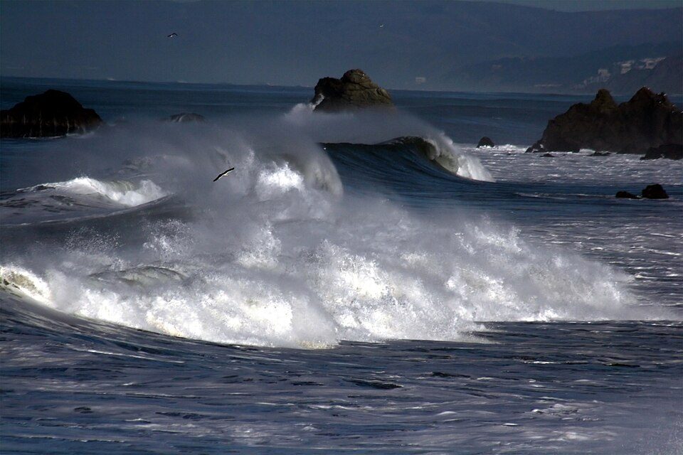 Heavy surf breaks on the California coast near Pacifica during a winter storm in 2008. Salinas officials say the winter storms of 2022-23 taught the city to stage flood defenses and shelters before the first big rain, not after.