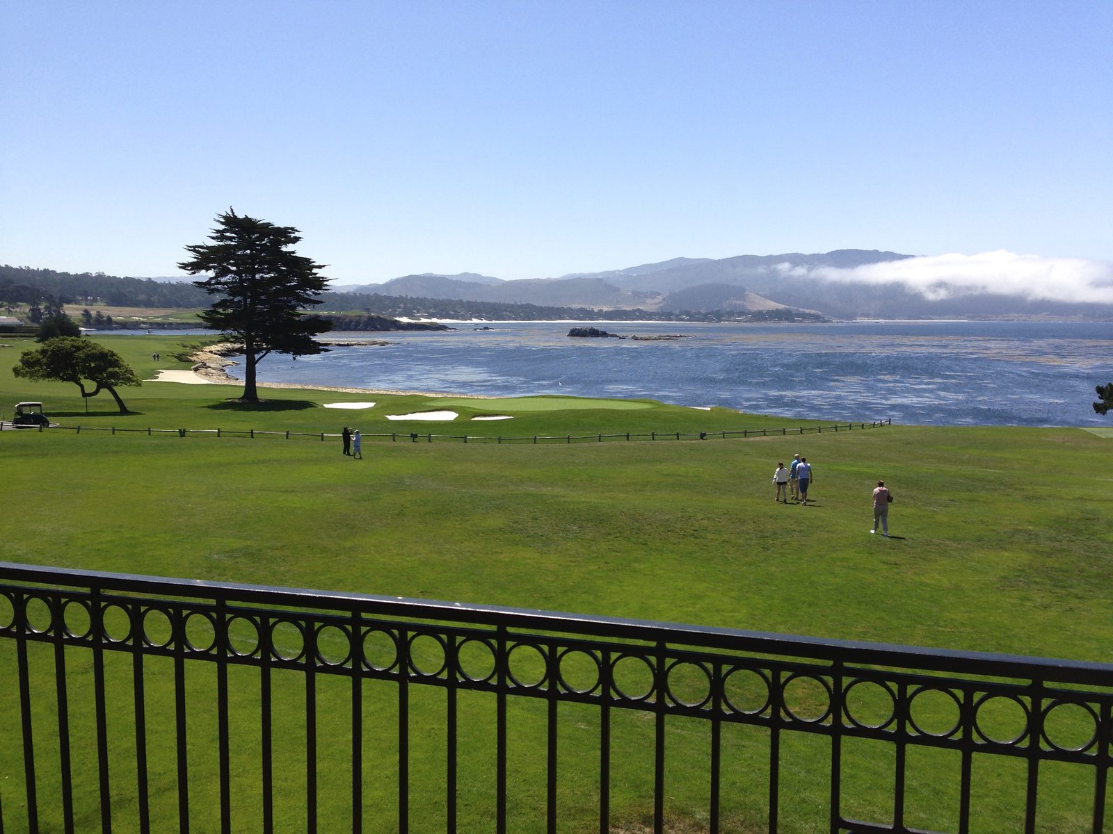 The 18th hole at Pebble Beach Golf Links, seen from The Lodge side in 2013, with Stillwater Cove beyond. The invitational's final round is scheduled at Pebble Beach on Wednesday.