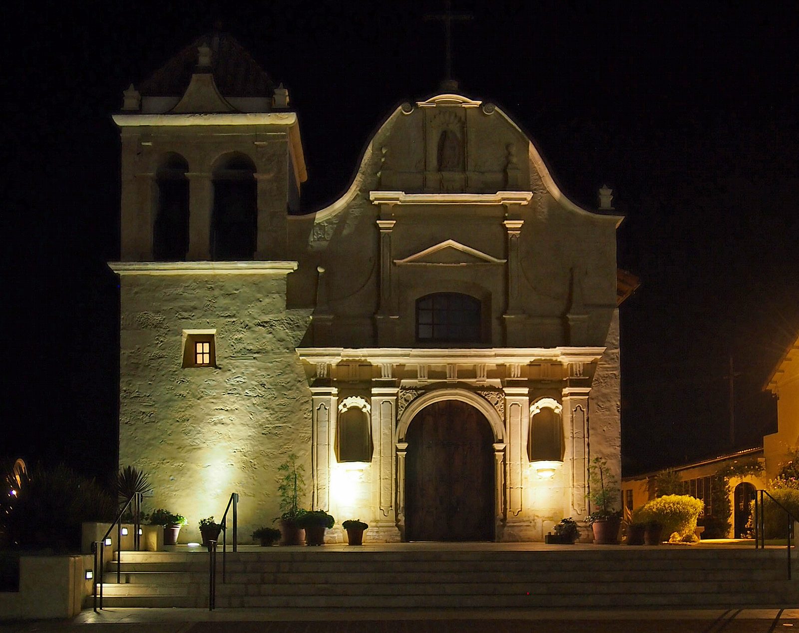 The Royal Presidio Chapel, California's oldest continuously operating parish, glows at night in downtown Monterey. The sheriff and district attorney had urged the board to keep the cameras.